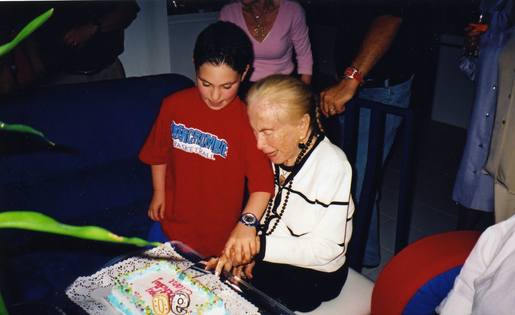 Cutting birthday cake